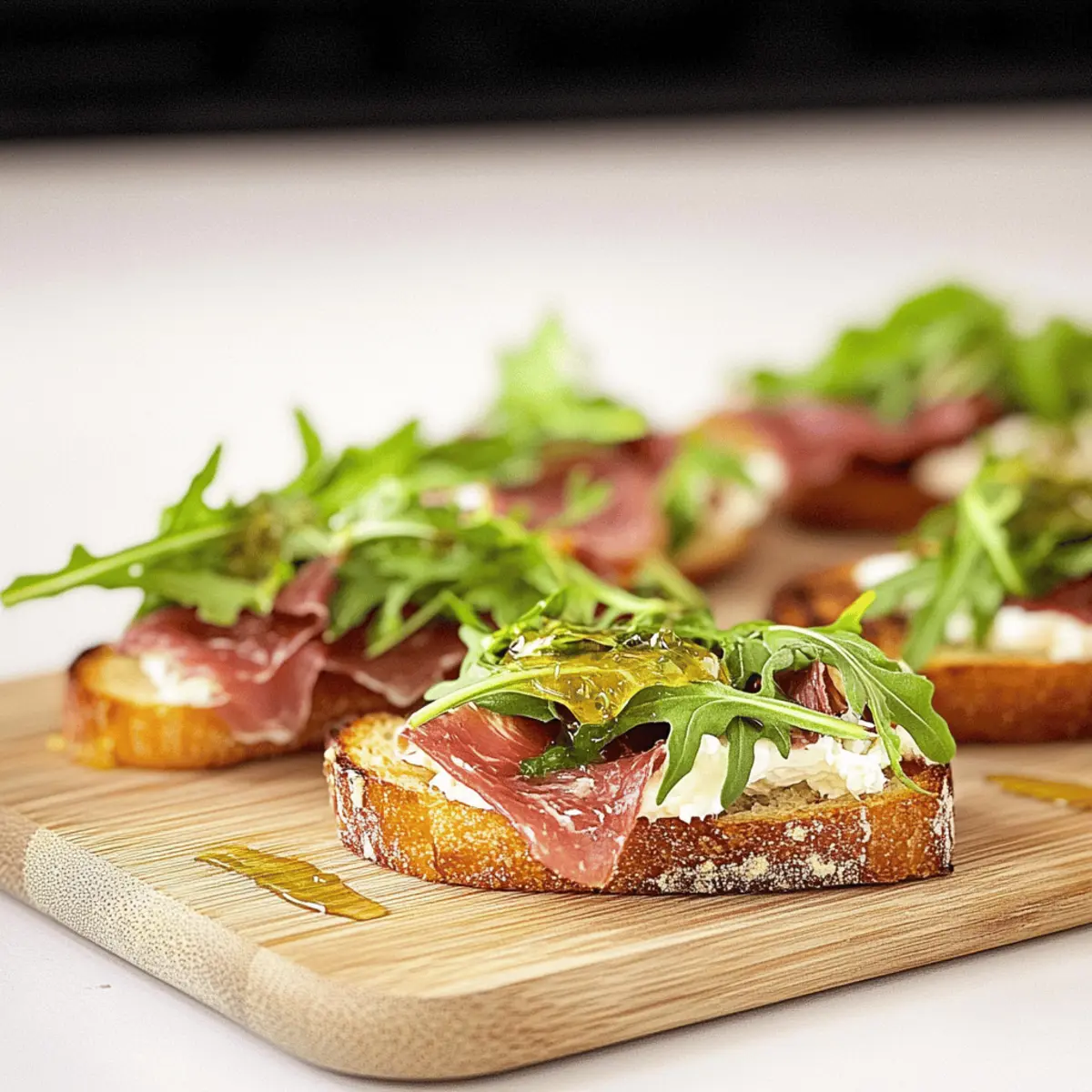 Irresistible Prosciutto Arugula Bruschetta with Honey Magic
