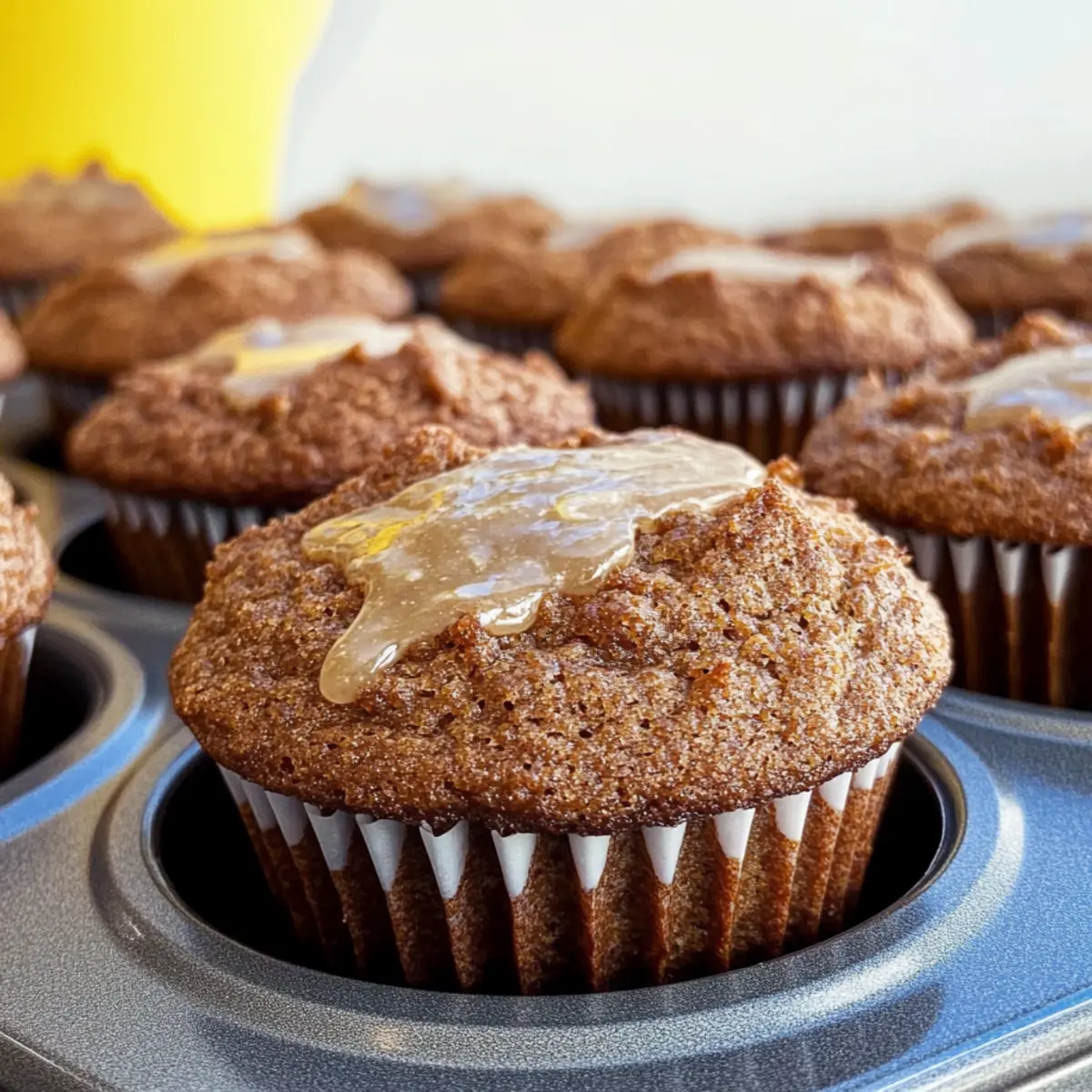 Moist Glazed Gingerbread Muffins with Lemon Zest Delight